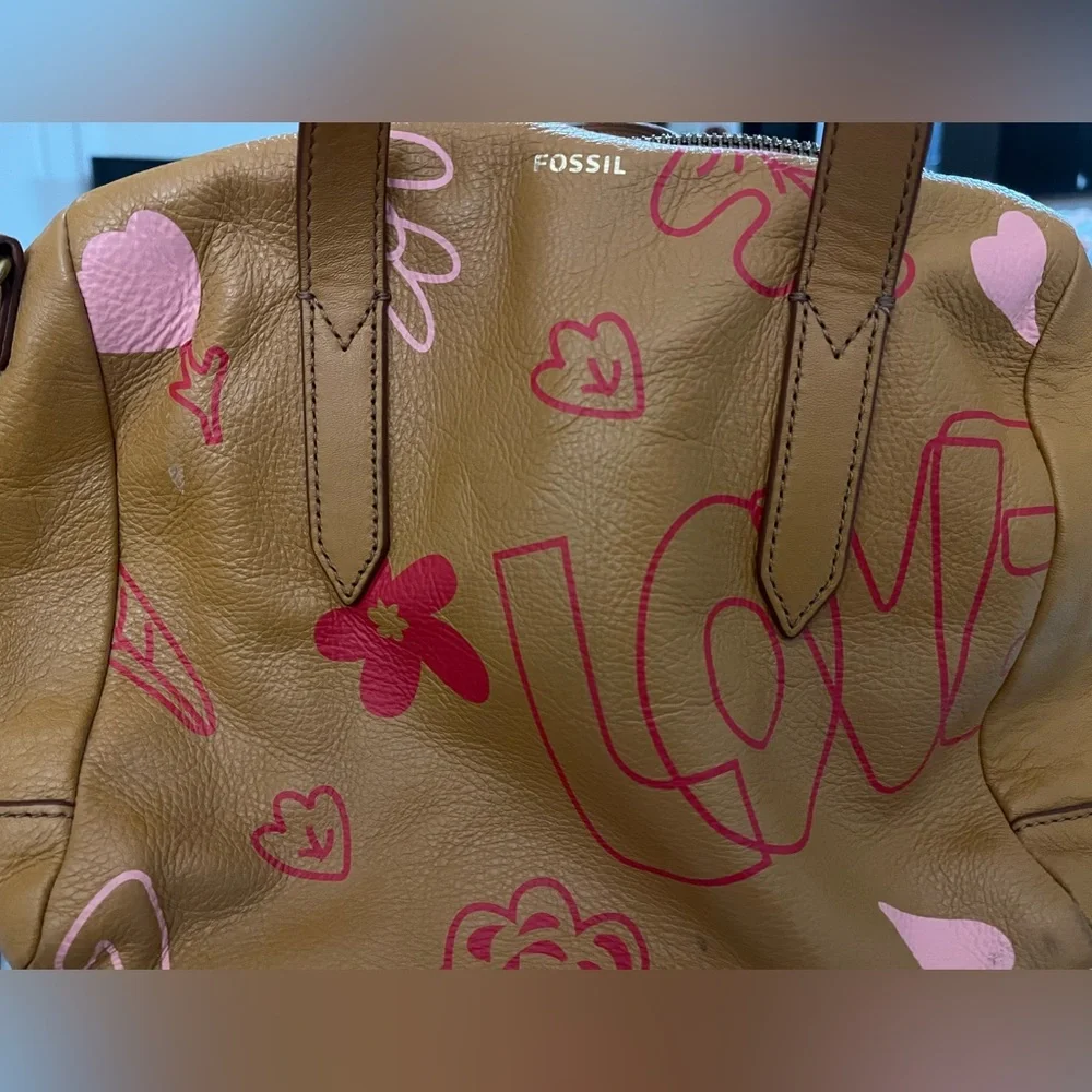 Camel leather Fossil bag. Has pink, red flowers and the word LOVE on front side. - Picture 1 of 4